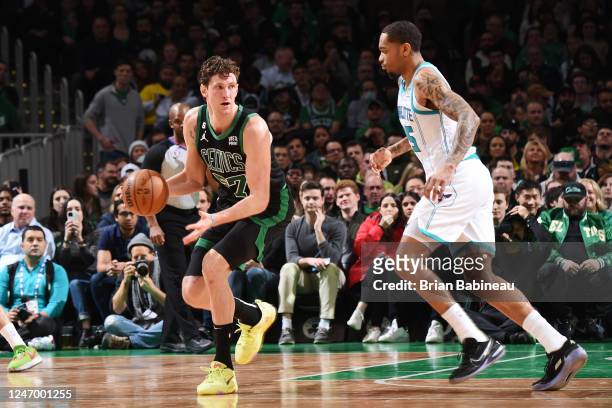 Mike Muscala of the Boston Celtics dribbles the ball during the game against the Charlotte Hornets on February 10, 2023 at the TD Garden in Boston,...