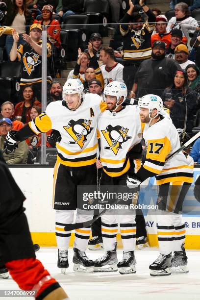 Evgeni Malkin of the Pittsburgh Penguins celebrate his goal with teammates during the second period against the Anaheim Ducks at Honda Center on...