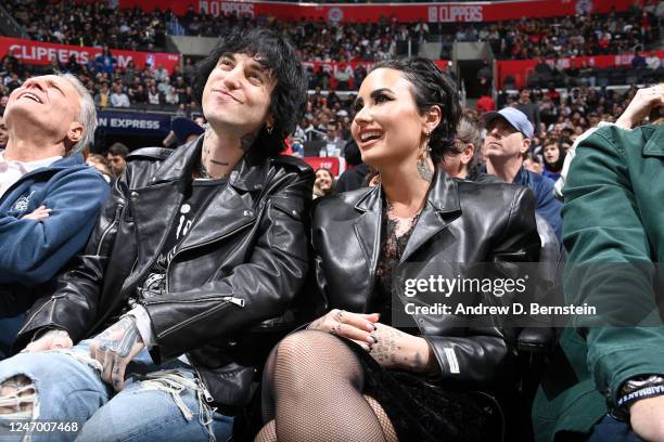 Jutes and Demi Lovato attend the game between the Milwaukee Bucks and LA Clippers on February 10, 2023 at Crypto.Com Arena in Los Angeles,...