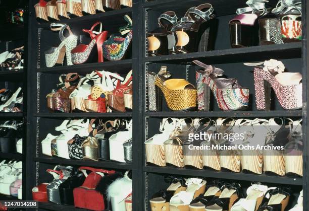 Colourful platform shoes in a shop, USA, circa 1975.