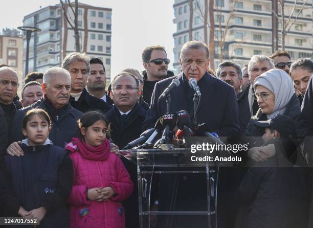 Turkish President Recep Tayyip Erdogan speaks to media after meeting with earthquake victims and pay condolences at the tent city after 7.7 and 7.6...