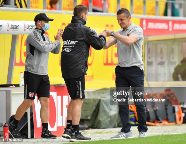 Head coach Mersad Selimbegovic of Regensburg celebrates after the Second Bundesliga match between SSV Jahn Regensburg and SV Darmstadt 98 at...