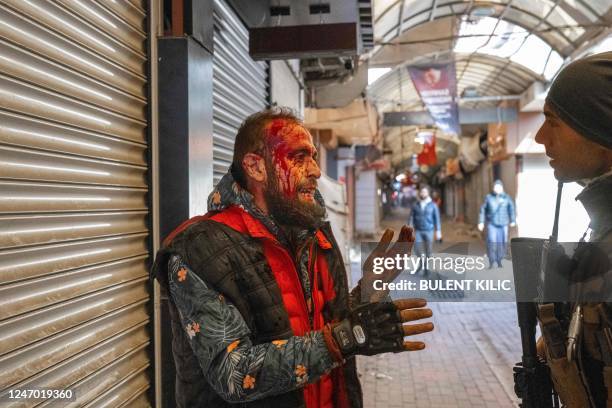 Man suspected to be thief speaks in the Antakia historical jewellery bazaar, after being reportedly beaten by locals and police in Hatay on February...