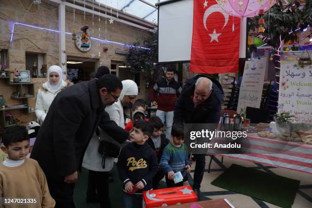 Palestinian pre-schoolers donate money for earthquake victims after 7.7 and 7.6 magnitude earthquakes hit southern Turkiye and northern Syria, in...