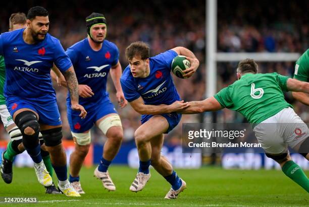 Dublin , Ireland - 11 February 2023; Damian Penaud of France evades the tackle of Peter OMahony of Ireland during the Guinness Six Nations Rugby...