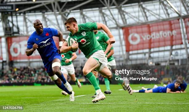 Dublin , Ireland - 11 February 2023; Garry Ringrose of Ireland celebrates on his way to scoring his side's fourth try, in the 72nd minute, during the...