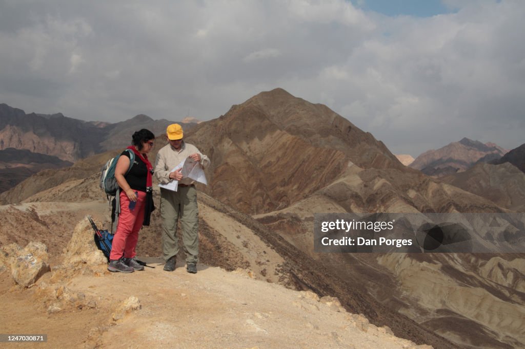 Looking at a map during a hike