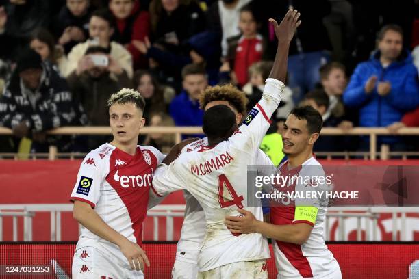 Monaco's French forward Wissam Ben Yedder celebrates with team mates after scoring a goal during the French L1 football match between Monaco and...