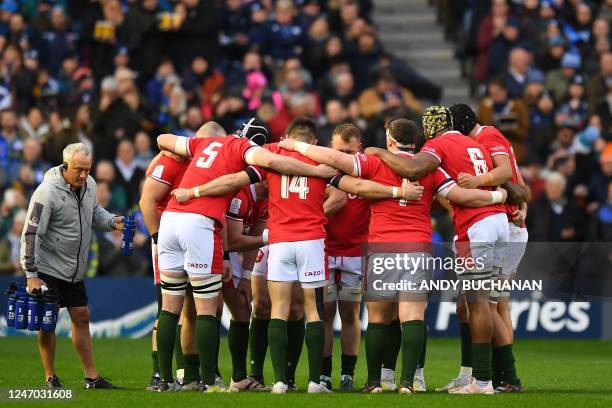 Wales players form a group huddle ahead of the Six Nations international rugby union match between Scotland and Wales at Murrayfield Stadium in...