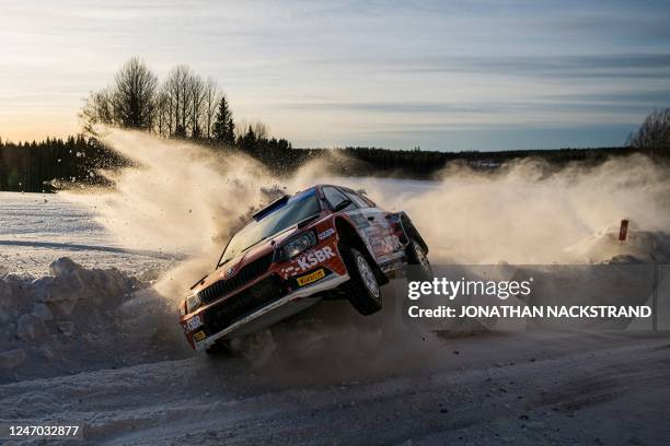 Jari Huttunen of Finland and his co-driver Antti Linnaketo of Finland crash their Skoda Fabia into the snowbank during the 12th stage of the Rally...
