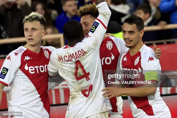 Monaco's French forward Wissam Ben Yedder celebrates with team mates after scoring a goal during the French L1 football match between Monaco and...