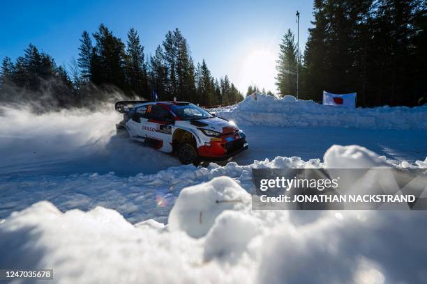 Takamoto Katsuta of Japan and his co-driver Aaron Johnston of Ireland steer their Toyota GR Yaris Rally 1 HYBRID during the 11th stage of the Rally...