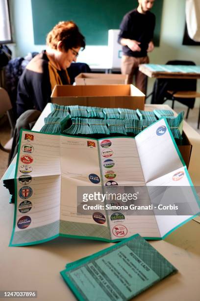 Tellers prepare the voting operations in a polling station with the signing and stamping of ballots for the renewal of the office of President of the...