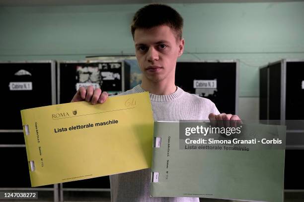 Teller shows in a polling station the electoral lists in green for women and yellow for men instead of the pink and blue of previous years. Last year...