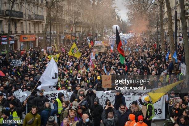 People stage a rally against French President's plan to raise the legal retirement age from 62 to 64 in Paris, France on February 11, 2023.