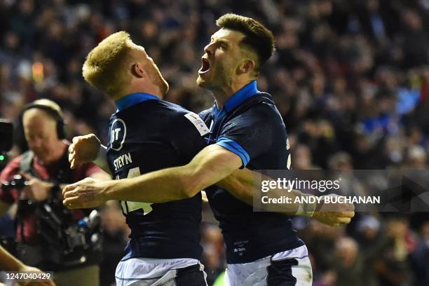 Scotland's wing Kyle Steyn celebrates with Scotland's Blair Kinghorn after scoring his second try during the Six Nations international rugby union...