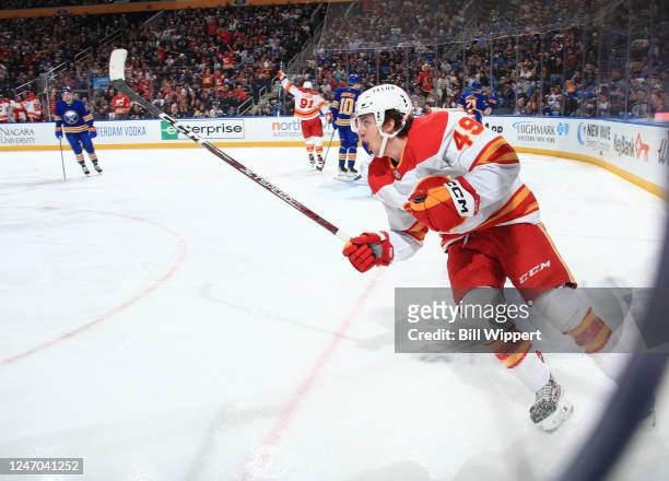Jakob Pelletier of the Calgary Flames celebrates the first goal of his NHL career against the Buffalo Sabres during a game on February 11, 2023 at...