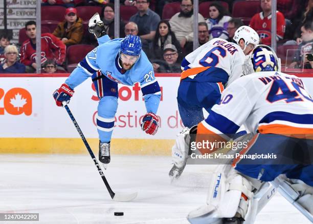 Jonathan Drouin of the Montreal Canadiens jumps up in the air during the second period against the New York Islanders at Centre Bell on February 11,...