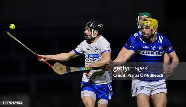 Laois , Ireland - 11 February 2023; Jamie Barron of Waterford in action against Ian Shanahan of Laois during the Allianz Hurling League Division 1...