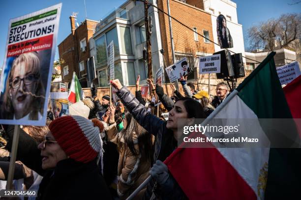 People protesting during a demonstration against executions and human rights violations in Iran marching to the Iranian embassy in Madrid. The...