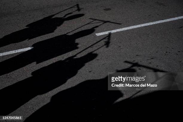 Silhouettes of hanged people are seen during a demonstration against executions and human rights violations in Iran marching to the Iranian embassy...