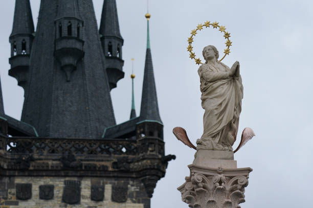 Statue of the Virgin Mary on a column stands in front of Tyn Church on Old Town Square after it had been installed two days earlier on June 06, 2020...