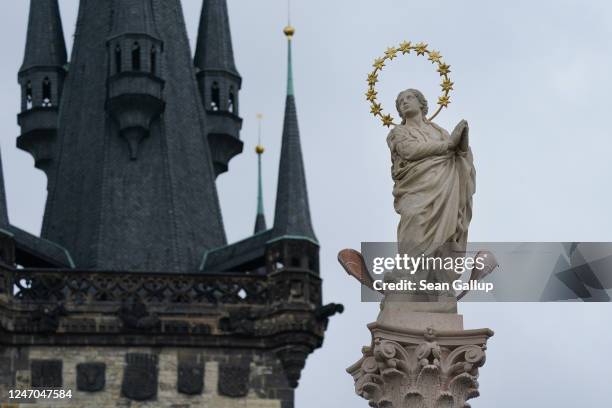 Statue of the Virgin Mary on a column stands in front of Tyn Church on Old Town Square after it had been installed two days earlier on June 06, 2020...