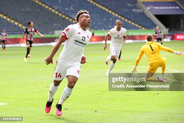 Pierre Kunde Malong of 1. FSV Mainz 05 celebrates after scoring his team's second goal during the Bundesliga match between Eintracht Frankfurt and 1....