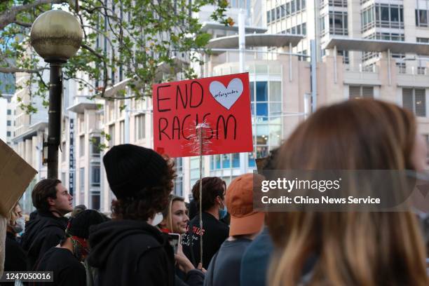 Protesters participate in a rally to show solidarity with the Black Lives Matter movement near Sydney Town Hall on June 6, 2020 in Sydney, Australia.