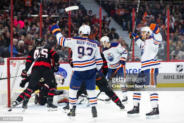 Edmonton Oilers Center Ryan Nugent-Hopkins celebrates his goal with Center Connor McDavid during third period National Hockey League action between...