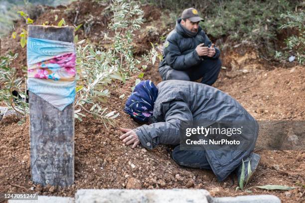 On 11 February 2023, the families of people who were killed in twin earthquakes that hit Turkey and Syria gathered at graveyards in Antakya, Hatay to...