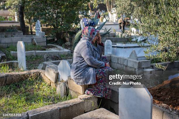 On 11 February 2023, the families of people who were killed in twin earthquakes that hit Turkey and Syria gathered at graveyards in Antakya, Hatay to...