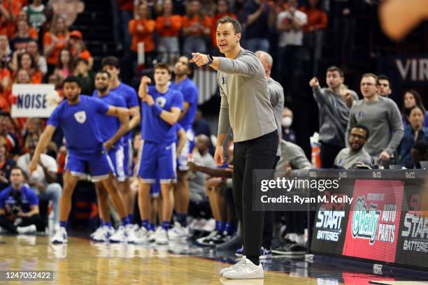 Head coach Jon Scheyer of the Duke Blue Devils reacts to a call in the first half during a game against the Virginia Cavaliers at John Paul Jones...