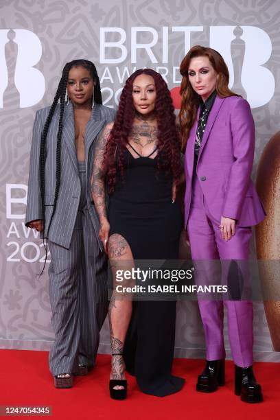 Members of the British band Sugababes Mutya Buena, Keisha Buchanan and Siobhan Donaghy poses on the red carpet upon arrival for the BRIT Awards 2023...