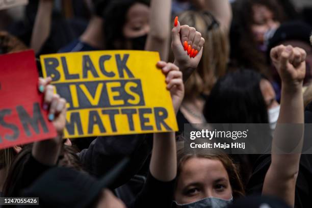 People protest against racism and police brutality on June 06, 2020 in Alexanderplatz in Berlin, Germany. Over 10,000 people attended a demonstration...