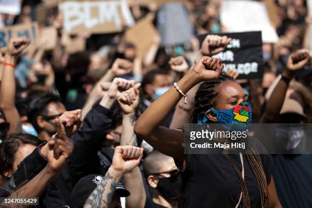People protest against racism and police brutality on June 06, 2020 in Alexanderplatz in Berlin, Germany. Over 10,000 people attended a demonstration...