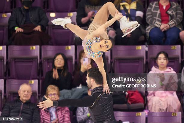 Canada's Deanna Stellato-Dudek and Maxime Deschamps compete in their free skate in the pairs event during the ISU Four Continents Figure Skating...