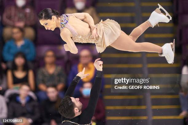 Canada's Deanna Stellato-Dudek and Maxime Deschamps compete in their free skate in the pairs event during the ISU Four Continents Figure Skating...