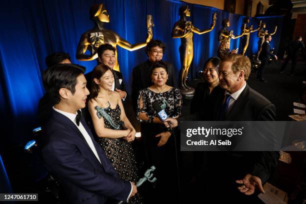 January 19, 2020: Parasite cast members Woo-sik Choi, Sun-kyun Lee, So-dam Park, Song Kang Ho, Jeong-eun Lee, and director Bong Joon-Ho backstage at...