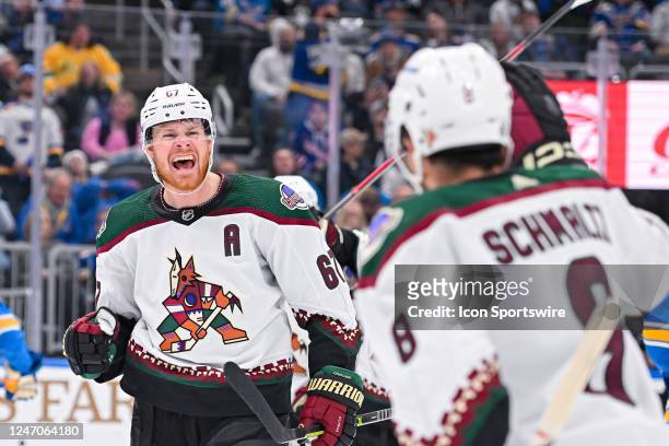 Arizona Coyotes left wing Lawson Crouse screams in celebration after scoring the tying goal from a pass from Arizona Coyotes center Nick Schmaltz...