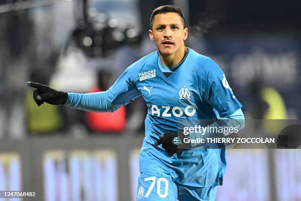 Marseille's Chilean forward Alexis Sanchez celebrates scoring his team's second goal during the French L1 football match between Clermont and...