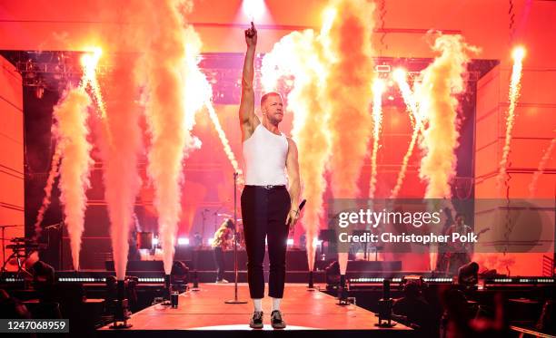 Wayne Sermon, Dan Reynolds and Ben McKee of Imagine Dragons perform onstage at the Fourth Edition of the Bud Light Super Bowl Music Fest presented by...