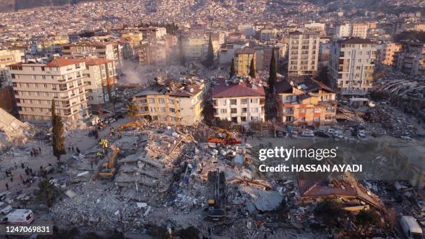 An aerial photo shows collapsed buildings in Antakya on February 11 after a 7.8-magnitude earthquake struck the country's southeast earlier in the...