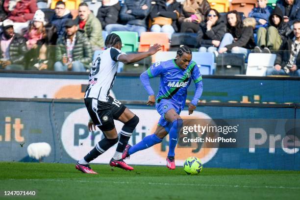 Sassuolo's Armand Lauriente in action against Udinese's Kingsley Ehizibue during the italian soccer Serie A match Udinese Calcio vs US Sassuolo on...