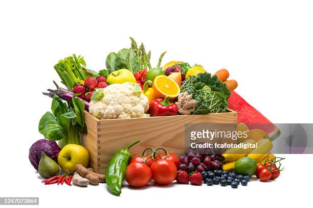 crate filled with healthy fresh organic fruits and vegetables isolated on white background - vegetable stock pictures, royalty-free photos & images