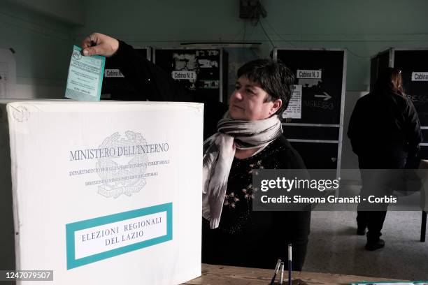 People vote in a polling station for the renewal of the office of President of the Region and of the Regional Council in the Lazio Region ,on...