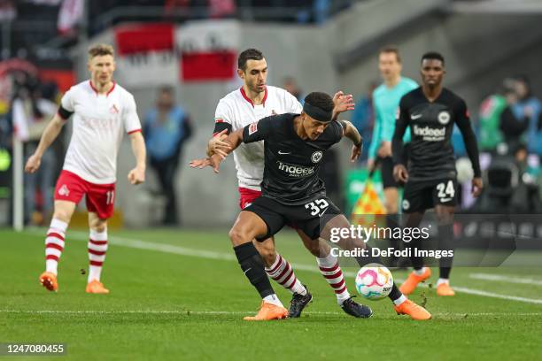 Tuta of Eintracht Frankfurt and Ellyes Skhiri of 1. FC Koeln battle for the ball during the Bundesliga match between 1. FC Köln and Eintracht...