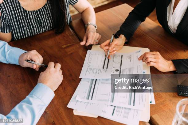 financial advisor meeting with couple - career ready stock pictures, royalty-free photos & images