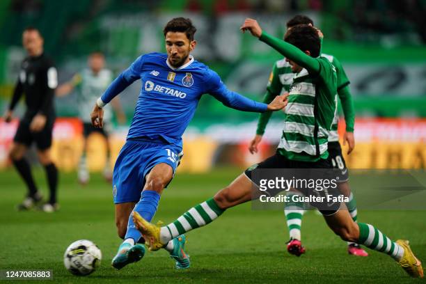 Marko Grujic of FC Porto with Francisco Trincao of Sporting CP in action during the Liga Bwin match between Sporting CP and FC Porto at Estadio Jose...