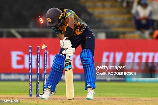 Sri Lanka's Anushka Sanjeewani is bowled by Bangladesh's Marufa Akter during the Group A T20 women's World Cup cricket match between Bangladesh and...